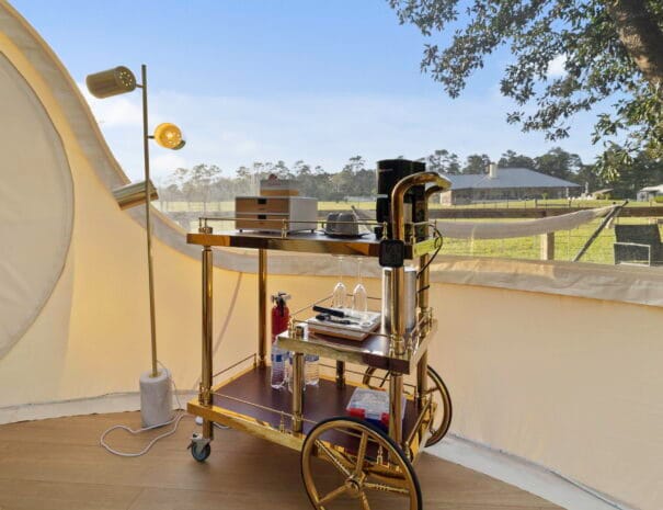 Your stay includes a stylish in-room beverage cart with a coffee maker, glassware, and refreshments—ready for sunrise sips or cozy evening drinks.