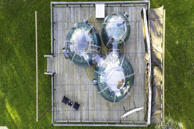 Glamping tent set in Texas Hill Country, offering a peaceful outdoor getaway with nature views